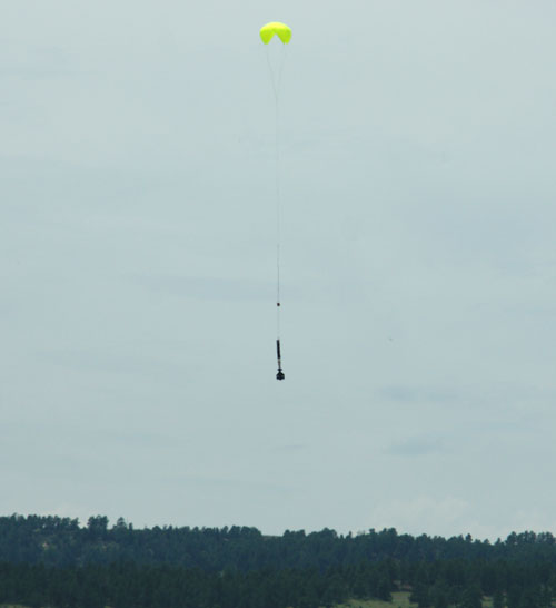 rocket parachuting back down rocket parachuting back down